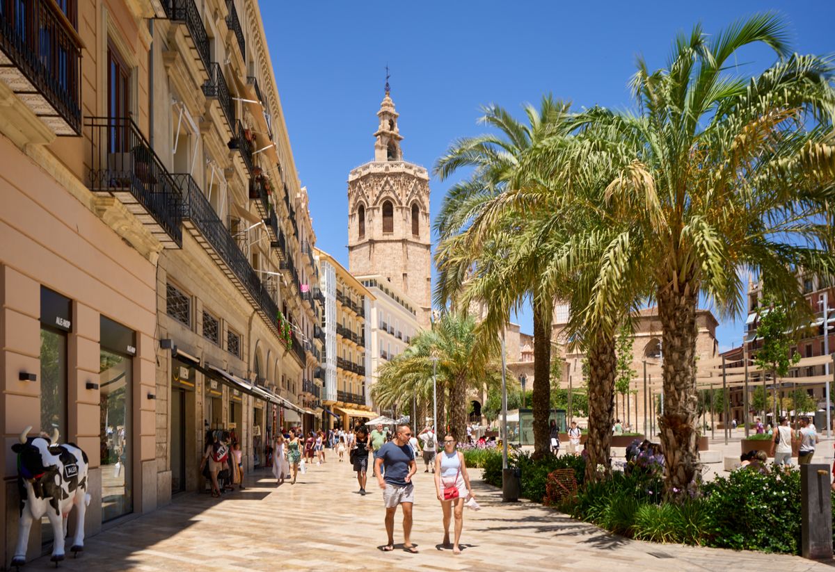 Street in Valencia's Old Town with the Cathedral tower in the background
